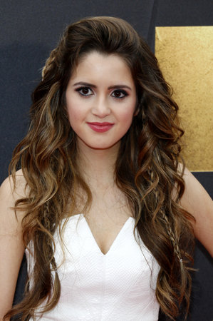 Laura Marano at the 2016 MTV Movie Awards held at the Warner Bros. Studios in Burbank, USA on April 9, 2016.のeditorial素材