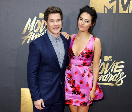Adam DeVine and Chloe Bridges at the 2016 MTV Movie Awards held at the Warner Bros. Studios in Burbank, USA on April 9, 2016.のeditorial素材