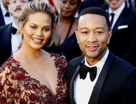 Chrissy Teigen and John Legend at the 88th Annual Academy Awards held at the Dolby Theatre in Hollywood, USA on February 28, 2016.のeditorial素材