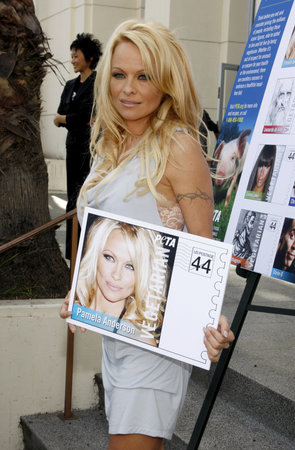 PETA Goes Postal: Pamela Anderson Unveils Vegetarian Icons Postage Sheet held at the Hollywood Post Office in Hollywood, USA on November 29, 2011.のeditorial素材