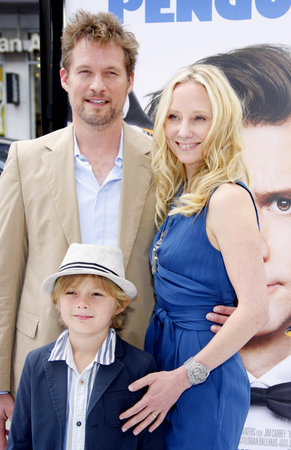 HOLLYWOOD, CA - JUNE 12, 2011: James Tupper, Homer Laffoon and Anne Heche at the Los Angeles premiere of 'Mr. Popper's Penguins' held at the Grauman's Chinese Theatre in Hollywood, USA on June 12, 2011.のeditorial素材