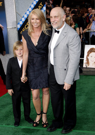HOLLYWOOD, CA - SEPTEMBER 30, 2010: John Malkovich and Peta Wilson at the Los Angeles premiere of 'Secretariat' held at the El Capitan Theater in Hollywood, USA on September 30, 2010.のeditorial素材