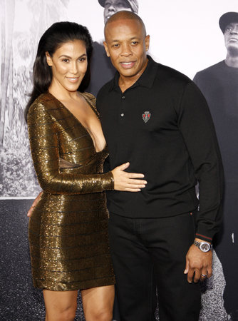 Dr. Dre and Nicole Young at the Los Angeles premiere of 'Straight Outta Compton' held at the Microsoft Theater in Los Angeles, USA on August 10, 2015.のeditorial素材