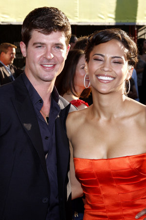 Robin Thicke and Paula Patton at the Los Angeles premiere of 'Swing Vote' held at the El Capitan Theater in Hollywood on July 24, 2008.のeditorial素材