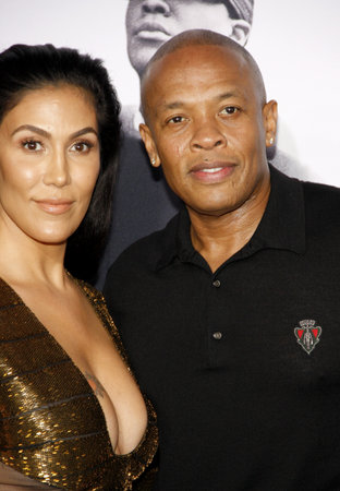 Dr. Dre and Nicole Young at the Los Angeles premiere of 'Straight Outta Compton' held at the Microsoft Theater in Los Angeles, USA on August 10, 2015.のeditorial素材