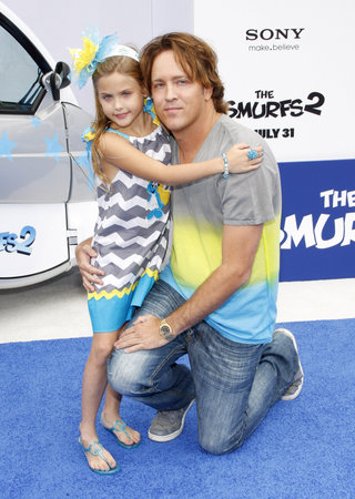 Larry Birkhead and Dannielynn Birkhead at the Los Angeles premiere of "Smurfs" held at the Regency Village Theater in Westwood, USA on July 28, 2013.のeditorial素材