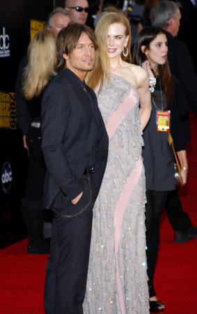 Keith Urban and Nicole Kidman at the 2009 American Music Awards held at the Nokia Theater in Los Angeles, California, United States on November 22, 2009.のeditorial素材