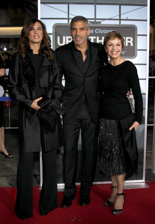George Clooney and Elisabetta Canalis at the Los Angeles Premiere of "Up In The Air" held at the Mann Village Theater in Westwood, USA on November 30, 2009.のeditorial素材