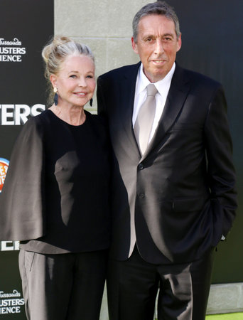 Ivan Reitman and Genevieve Robert at the World premiere of 'Ghostbusters' held at the TCL Chinese Theatre in Hollywood, USA on July 9, 2016.のeditorial素材
