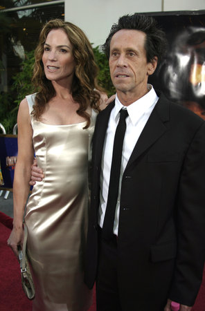 Producer Brian Grazer and spouse Gigi Levangie at the Los Angeles premiere of "Cinderella Man" held at the Gibson Amphitheatre at Universal City in Hollywood, USA on May 23, 2005.のeditorial素材