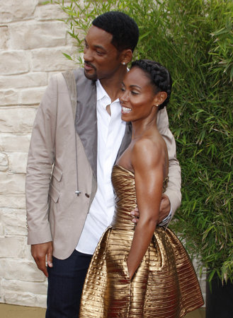Will Smith and Jada Pinkett Smith at the Los Angeles premiere of "The Karate Kid" held at the Mann Village Theater in Westwood, USA on June 7, 2010.のeditorial素材