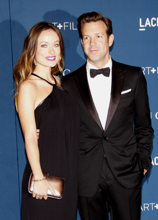 Olivia Wilde and Jason Sudeikis at the LACMA 2013 Art + Film Gala Honoring Martin Scorsese And David Hockney Presented By Gucci held at the LACMA in Los Angeles, USA on November 2, 2013.のeditorial素材