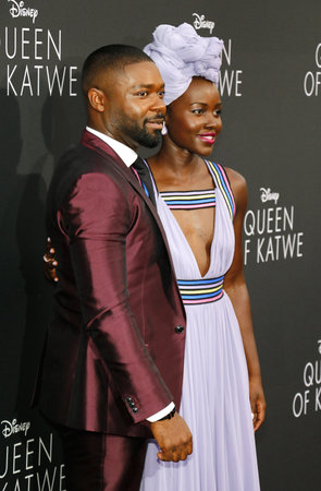 David Oyelowo and Lupita Nyong'o at the Los Angeles premiere of 'Queen Of Katwe' held at the El Capitan Theatre in Hollywood, USA on September 20, 2016.のeditorial素材