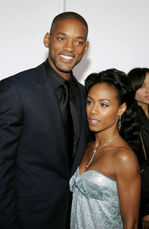 Will Smith and Jada Pinkett Smith at the Los Angeles premiere of "The Pursuit of Happyness" held at the Mann Village Theater in Westwood, USA on December 7, 2006.のeditorial素材