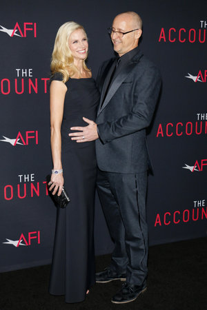 Brooke Burns and Gavin O'Connor at the Los Angeles premiere of 'The Accountant' held at the TCL Chinese Theater in Hollywood, USA on October 10, 2016.のeditorial素材