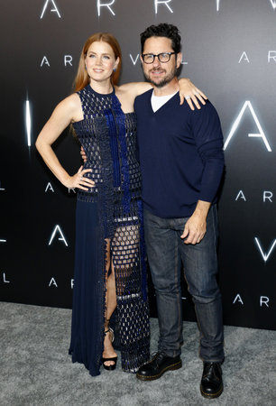 J.J. Abrams and Amy Adams at the Los Angeles premiere of 'Arrival' held at the Regency Village Theater in Westwood, USA on November 6, 2016.のeditorial素材