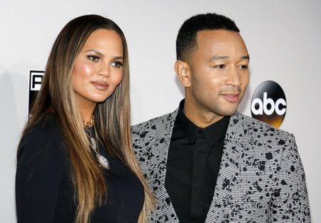 Chrissy Teigen and John Legend at the 2016 American Music Awards held at the Microsoft Theater in Los Angeles, USA on November 20, 2016.のeditorial素材