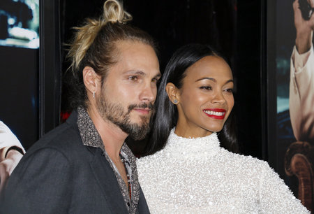 Marco Perego Saldana and Zoe Saldana at the Los Angeles premiere of 'Live By Night' held at the TCL Chinese Theatre in Hollywood, USA on January 9, 2017.のeditorial素材