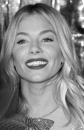 Sienna Miller at the Los Angeles premiere of 'Live By Night' held at the TCL Chinese Theatre in Hollywood, USA on January 9, 2017.のeditorial素材