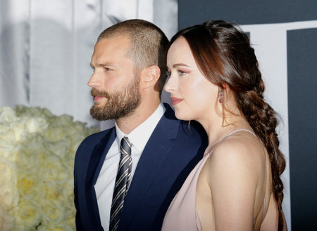 Jamie Dornan and Dakota Johnson at the Los Angeles premiere of 'Fifty Shades Darker' held at the Theatre at Ace Hotel in Los Angeles, USA on February 2, 2017.のeditorial素材