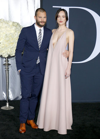 Jamie Dornan and Dakota Johnson at the Los Angeles premiere of 'Fifty Shades Darker' held at the Theatre at Ace Hotel in Los Angeles, USA on February 2, 2017.のeditorial素材