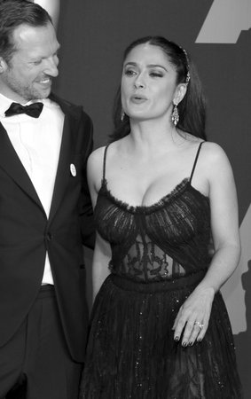 Orlando von Einsiedel and Salma Hayek at the 89th Annual Academy Awards - Press Room held at the Hollywood and Highland Center in Hollywood, USA on February 26, 2017.のeditorial素材