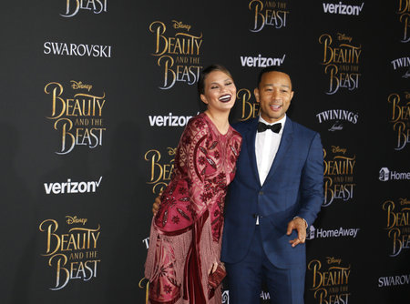 Chrissy Teigen and John Legend at the Los Angeles premiere of 'Beauty And The Beast' held at the El Capitan Theatre in Hollywood, USA on March 2, 2017.のeditorial素材