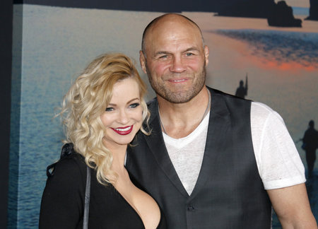 Randy Couture and Mindy Robinson at the Los Angeles premiere of 'Kong: Skull Island' held at the El Capitan Theatre in Hollywood, USA on March 8, 2017.のeditorial素材