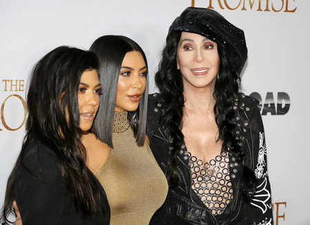Kim Kardashian West, Kourtney Kardashian and Cher at the Los Angeles premiere of 'The Promise' held at the TCL Chinese Theatre in Hollywood, USA on April 12, 2017.のeditorial素材