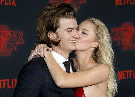 Joe Keery and Maika Monroe at the Netflix's season 2 premiere of 'Stranger Things' held at the Regency Village Theatre in Westwood, USA on October 26, 2017.のeditorial素材
