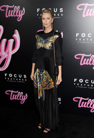 Charlize Theron at the Los Angeles premiere of 'Tully' held at the Regal LA LIVE Stadium 14 in Los Angeles, USA on April 18, 2018.のeditorial素材