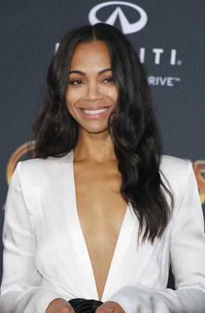 Zoe Saldana at the premiere of Disney and Marvel's 'Avengers: Infinity War' held at the El Capitan Theatre in Hollywood, USA on April 23, 2018.のeditorial素材