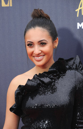 Francia Raisa at the 2018 MTV Movie And TV Awards held at the Barker Hangar in Santa Monica, USA on June 16, 2018.のeditorial素材