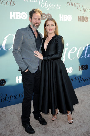 Amy Adams and Darren Le Gallo at the Los Angeles premiere of HBO's Limited Series 'Sharp Objects' held at the Cinerama Dome in Hollywood, USA on June 26, 2018.のeditorial素材