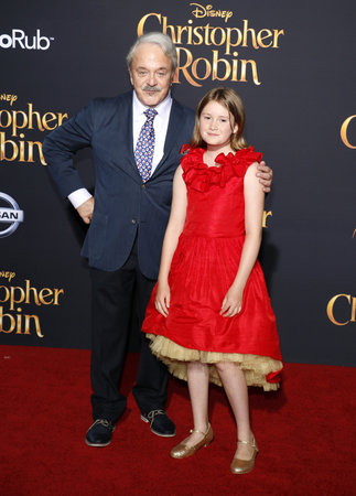 Bronte Carmichael and Jim Cummings at the Los Angeles premiere of 'Christopher Robin' held at the Walt Disney Studios in Burbank, USA on July 30, 2018.のeditorial素材