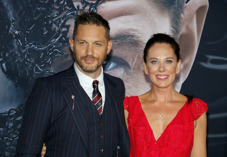 Tom Hardy and Kelly Marcel at the Los Angeles premiere of 'Venom' held at the Regency Village Theatre in Westwood, USA on October 1, 2018.のeditorial素材
