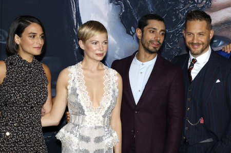 Riz Ahmed, Reid Scott, Tom Hardy and Michelle Williams at the Los Angeles premiere of 'Venom' held at the Regency Village Theatre in Westwood, USA on October 1, 2018.のeditorial素材