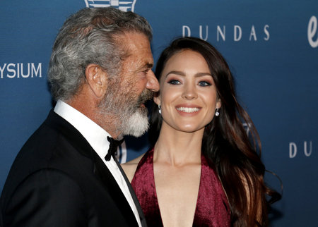 Mel Gibson and Rosalind Ross at the Art Of Elysium's 12th Annual Heaven Celebration held at the Private Venue in Los Angeles, USA on January 5, 2019.のeditorial素材