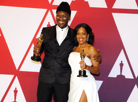 Regina King and Mahershala Ali at the 91st Annual Academy Awards - Press Room held at the Loews Hotel in Hollywood, USA on February 24, 2019.のeditorial素材