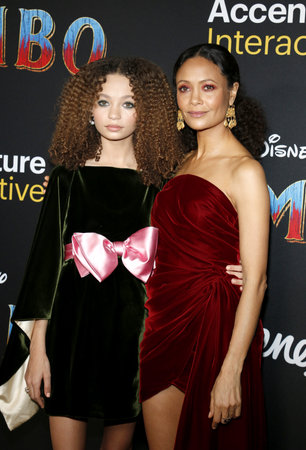 Thandie Newton and Nico Parker at the World premiere of 'Dumbo' held at the El Capitan Theatre in Hollywood, USA on March 11, 2019.のeditorial素材