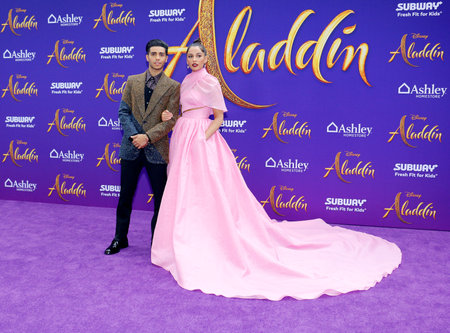 Mena Massoud and Naomi Scott at the Los Angeles premiere of 'Aladdin' held at the El Capitan Theatre in Hollywood, USA on May 21, 2019.のeditorial素材