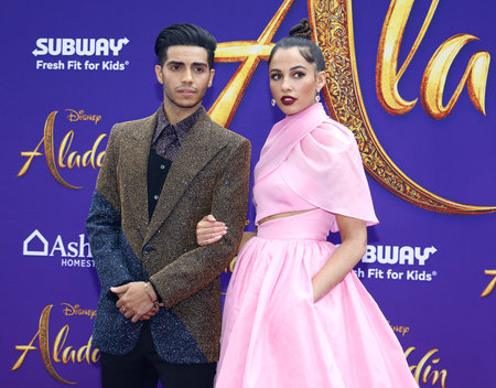 Mena Massoud and Naomi Scott at the Los Angeles premiere of 'Aladdin' held at the El Capitan Theatre in Hollywood, USA on May 21, 2019.のeditorial素材