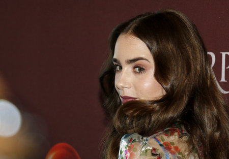 Lily Collins at the 'Les Miserables' Photo Call held at the Linwood Dunn Theater in Hollywood, USA on June 8, 2019.のeditorial素材