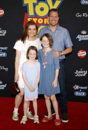 Alyson Hannigan, Alexis Denisof, Satyana Marie Denisof and Keeva Jane Denisof at the World premiere of 'Toy Story 4' held at the El Capitan Theater in Hollywood, USA on June 11, 2019.のeditorial素材