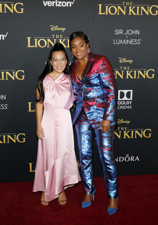 Ali Wong and Tiffany Haddish at the World premiere of 'The Lion King' held at the Dolby Theatre in Hollywood, USA on July 9, 2019.のeditorial素材