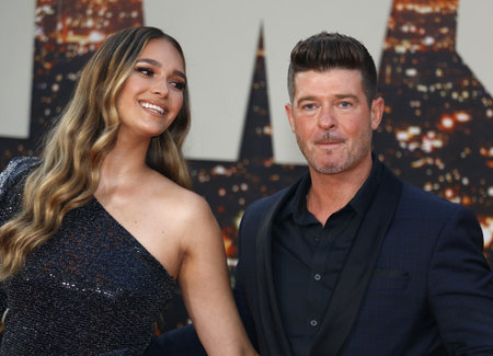 April Love Geary and Robin Thicke at the Los Angeles premiere of 'Once Upon a Time In Hollywood' held at the TCL Chinese Theatre in Hollywood, USA on July 22, 2019.のeditorial素材