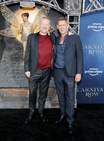 Jamie Harris and Jared Harris at the Los Angeles premiere of Amazon's 'Carnival Row' held at the TCL Chinese Theatre in Hollywood, USA on August 21, 2019.のeditorial素材