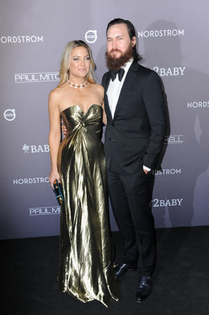 Kate Hudson and Danny Fujikawa at the 2019 Baby2Baby Gala Presented By Paul Mitchell held at the 3LABS in Culver City, USA on November 9, 2019.のeditorial素材