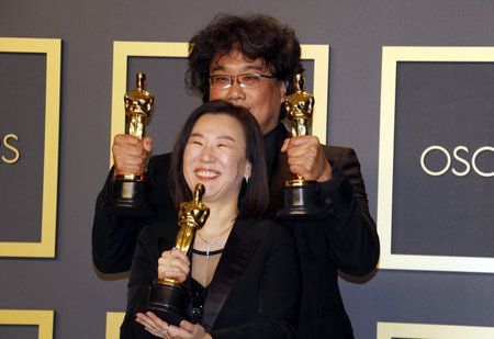 Bong Joon-ho and Kwak Sin-ae at the 92nd Academy Awards - Press Room held at the Dolby Theatre in Hollywood, USA on February 9, 2020.のeditorial素材