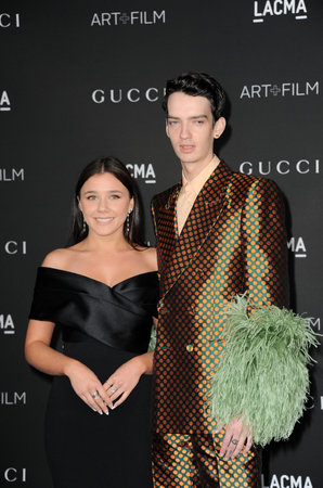 Kodi Smit-McPhee and Rebecca Phillipou  at the 10th Annual LACMA ART+FILM GALA Presented By Gucci held at the LACMA in Los Angeles, USA on November 6, 2021.のeditorial素材